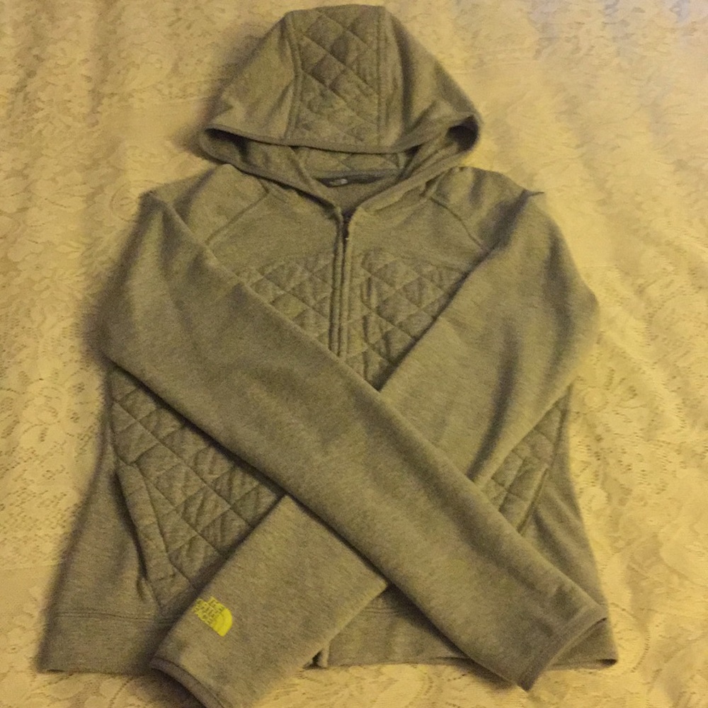 Light gray North Face jacket.